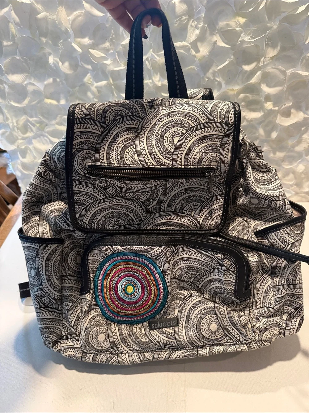 Sakroots Black & White Patterned Backpack with Multicolor Embroidered Circle